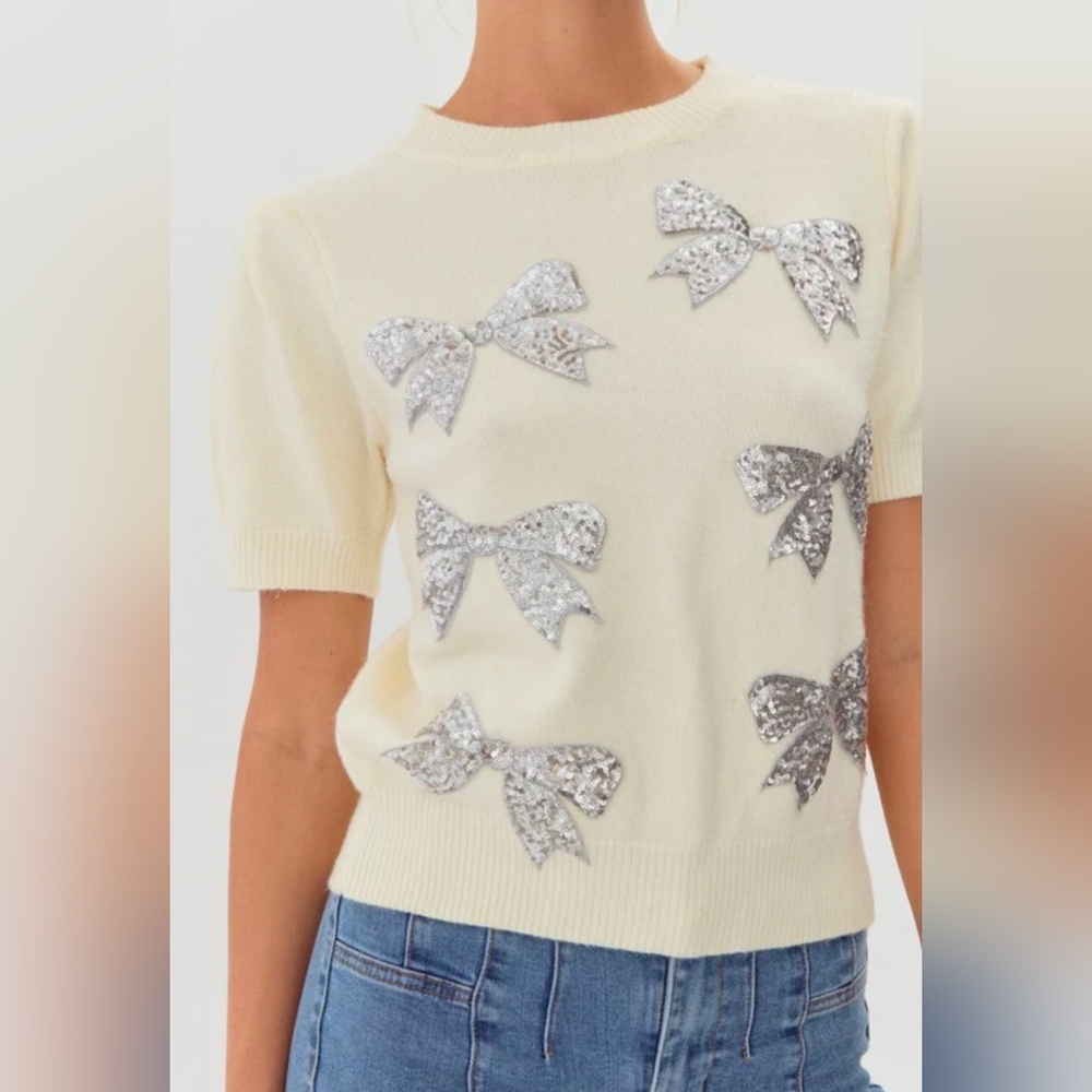 Chic Cream Sweater with Silver Sequin Bows